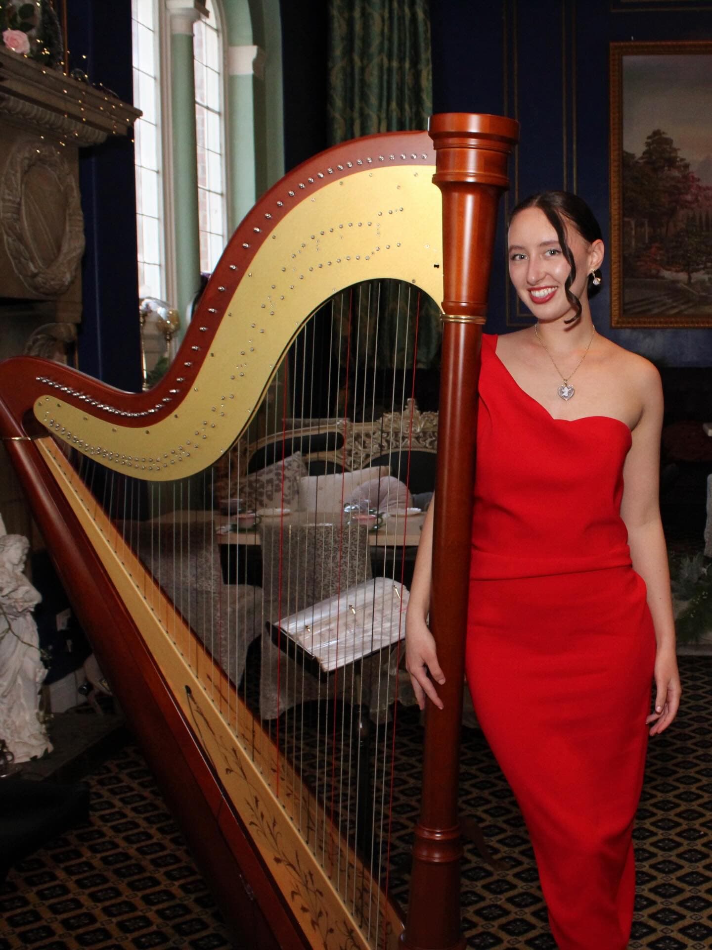 Amalia Diaz performing with her harp